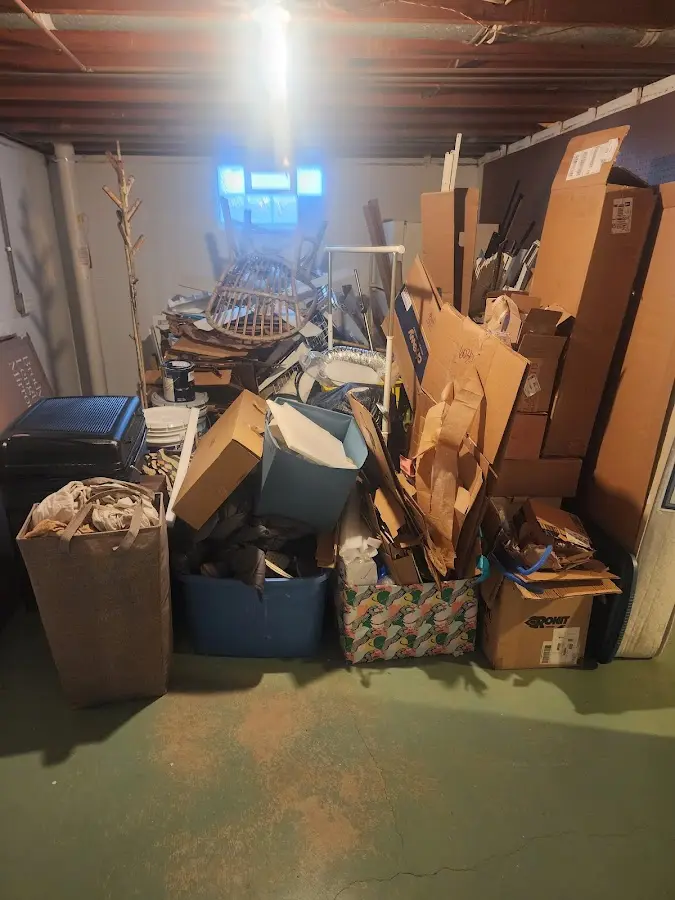 Roll-off dumpster container at job site for Construction Dumpster Rental in Weston